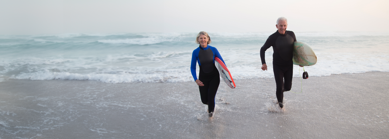 couple running on the beach